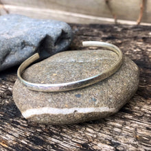 Load image into Gallery viewer, Medium-sized sterling silver adjustable bracelet.
