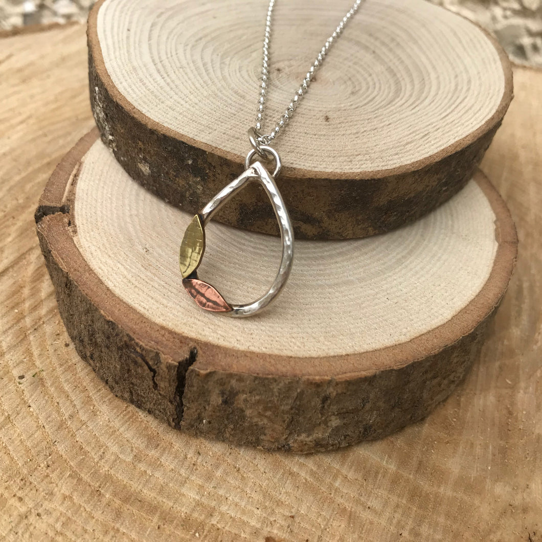 Teardrop brass and copper leaf silver pendant
