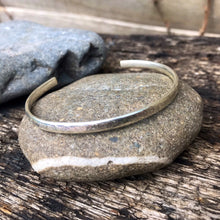 Load image into Gallery viewer, Medium-sized sterling silver adjustable bracelet.
